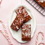 vegan peppermint brownies on a white plate
