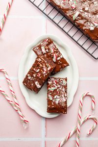 vegan peppermint brownies on a white plate